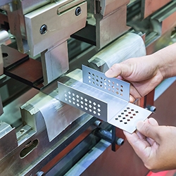 Stamping process of a formed metal part for shieding